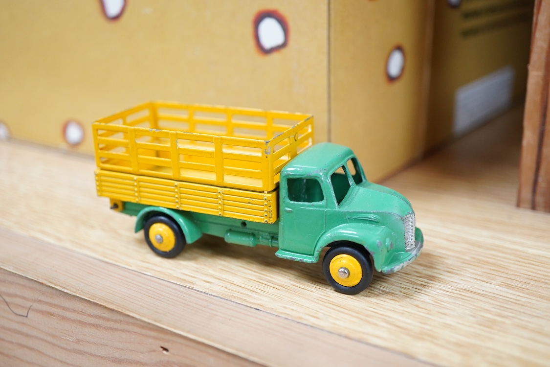 Twenty-five Dinky Toys including; Foden FG wagon, Leyland octopus wagon, TV mobile control room, Ford Zephyr, Volkswagen Karmann Ghia, Desoto Fireflite, Austin Healey 100, Hillman Minx, etc.